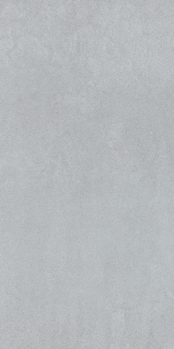 Sleek, full-body porcelain tile in polished ice gray, exuding modern sophistication with seamless rectified edges for a refined minimalist aesthetic.