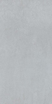 Sleek, full-body porcelain tile in polished ice gray, exuding modern sophistication with seamless rectified edges for a refined minimalist aesthetic.