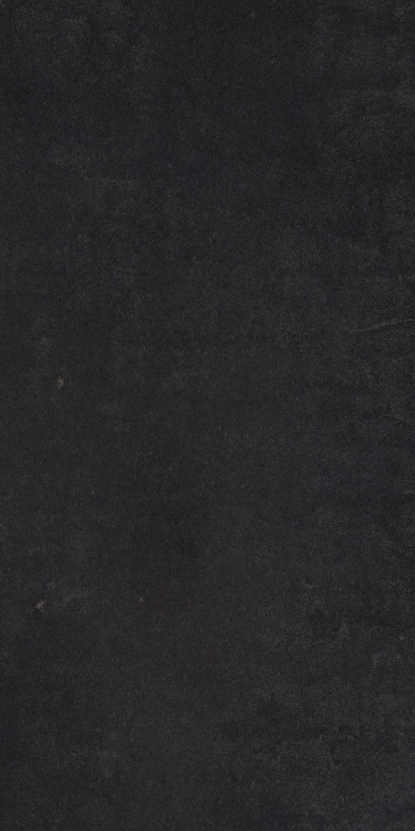 Glossy black porcelain tile with a sleek, modern finish, exuding timeless sophistication and minimalist elegance for refined interiors.