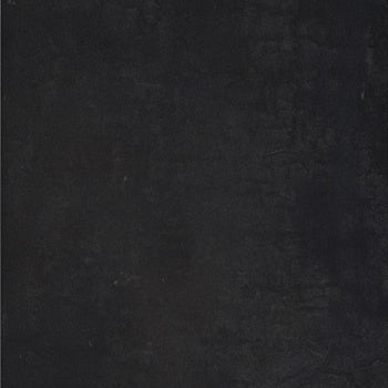 Black full-body porcelain tile with a matte finish, sleek modern elegance for refined residential and commercial interiors.