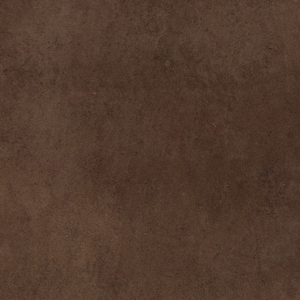 Matte brown porcelain tile with a sleek, minimalist aesthetic and refined full-body texture for modern interiors.