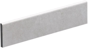Glossy gray porcelain bullnose trim with sleek modern edges for refined contemporary interiors.