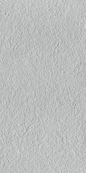 Matte bush-hammered porcelain tile in soft ice gray, full-body texture for a sleek, minimalist look with rustic sophistication.