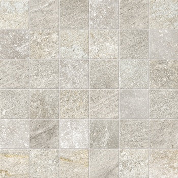Matte gray dolomite-inspired porcelain mosaic with rugged slate-cut texture, evoking Appalachian stone strength and organic modern elegance.