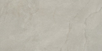 Luxurious gray marble-look porcelain tile with a softly textured, well-worn surface and natural geometric veining for timeless elegance.