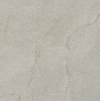 Luxurious matte gray porcelain tile with refined marble veining and a softly textured, well-worn surface for timeless elegance.