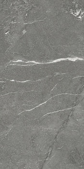 Dark grey porcelain tile with a matte marble finish, exuding rugged elegance and industrial sophistication for modern interiors.