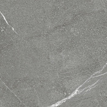 A bold, matte dark grey porcelain tile with the rugged elegance of natural marble, slip-resistant and rectified for seamless luxury.