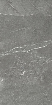 Matte dark grey porcelain tile with refined marble texture, exuding bold sophistication and industrial elegance for modern interiors.