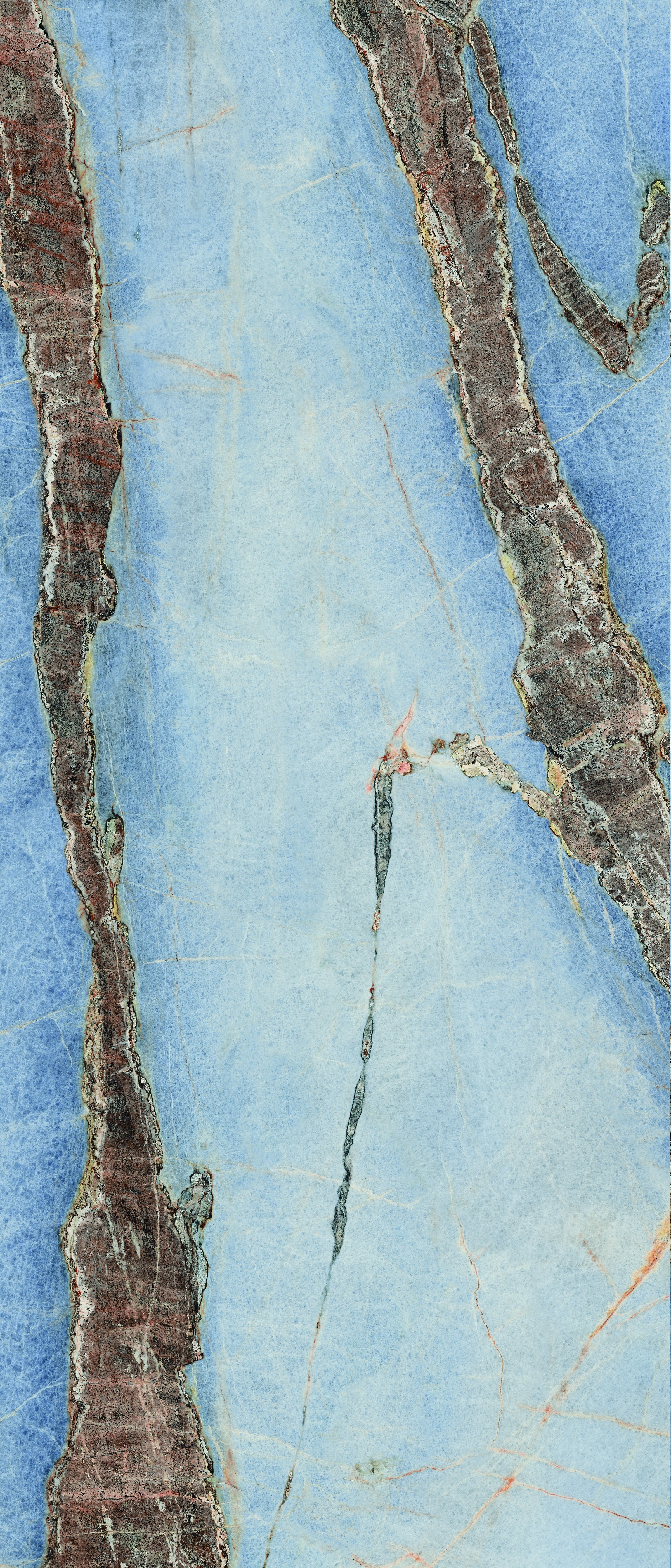 Luxurious matte blue onyx porcelain tile with refined veining, embodying dramatic elegance and sensual depth for sophisticated interiors.