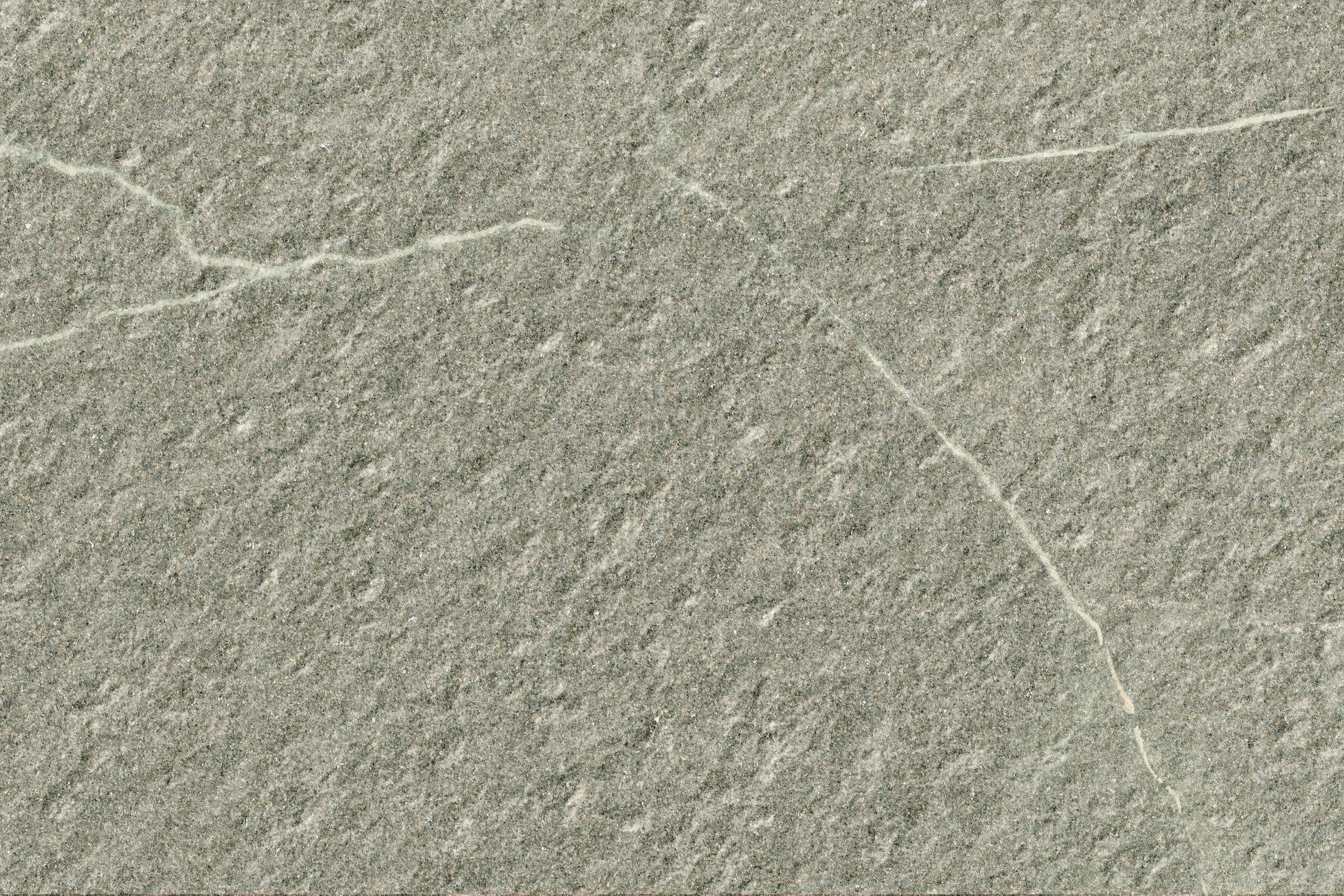 Textured greige porcelain paving tile with limestone-inspired elegance, blending urban sophistication and natural warmth for outdoor luxury.
