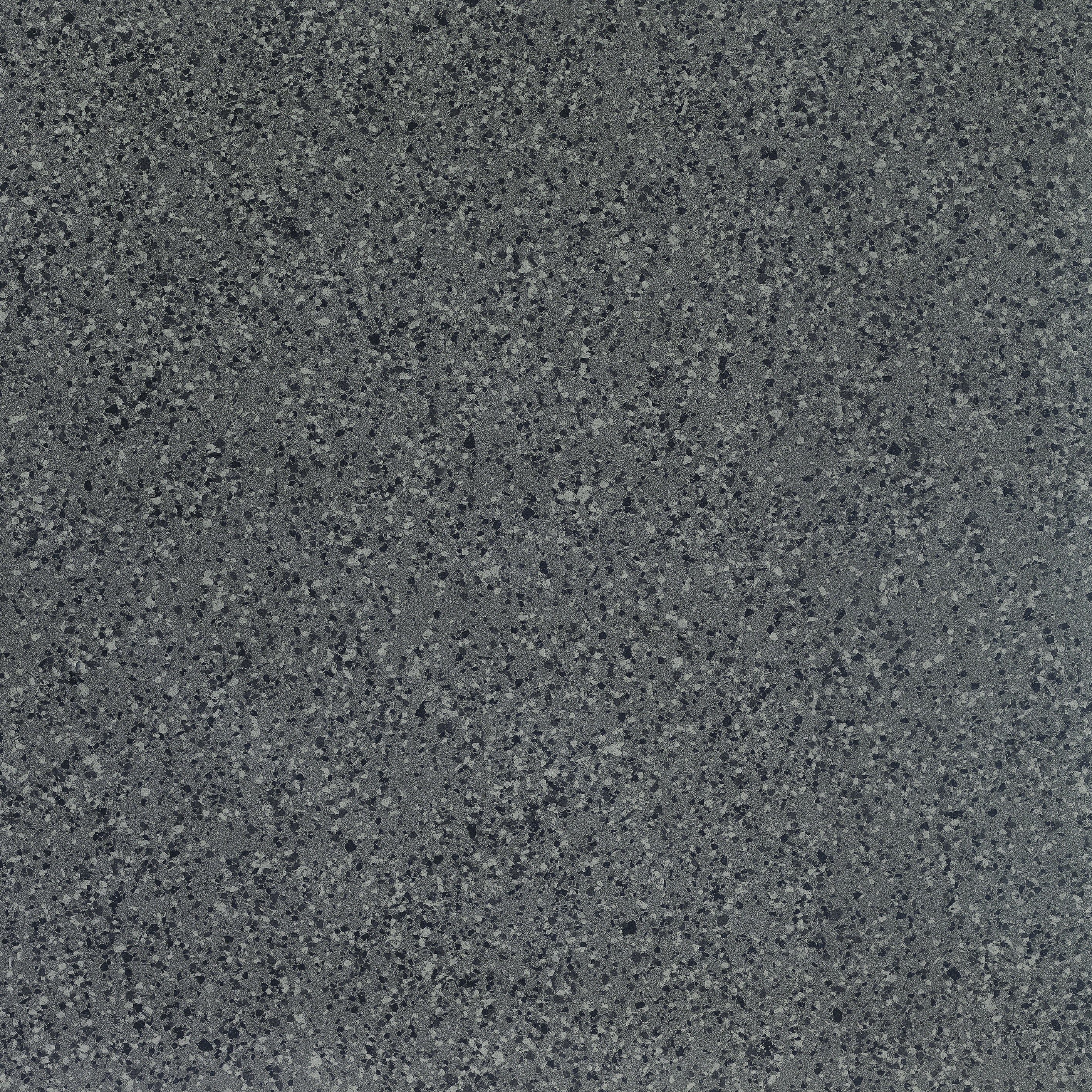 Matte dark gray terrazzo-look porcelain tile with medium grain texture, exuding warm minimalist elegance and timeless sophistication.