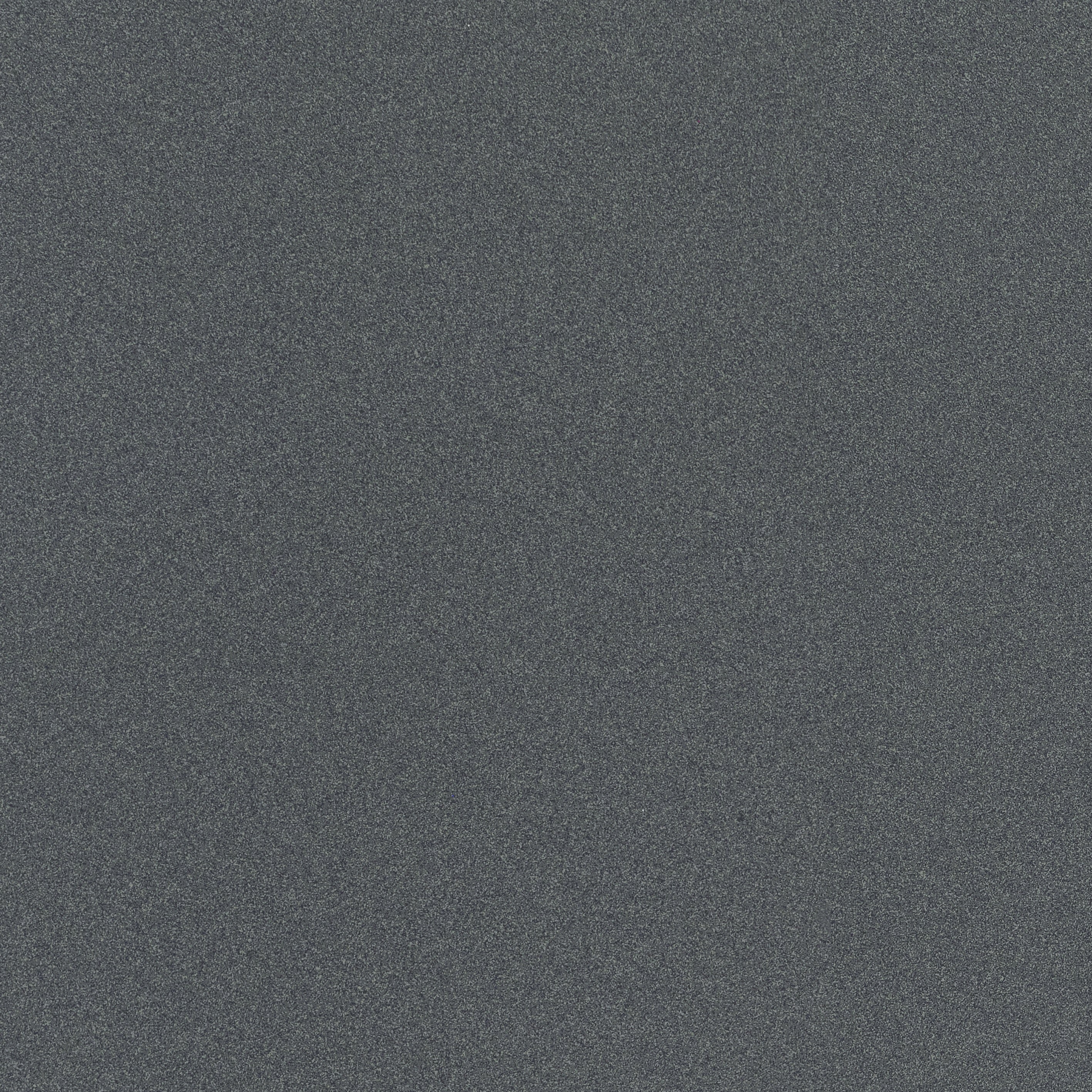 Dark gray terrazzo-look porcelain tile with fine grain texture, matte finish, and refined industrial elegance for modern interiors.