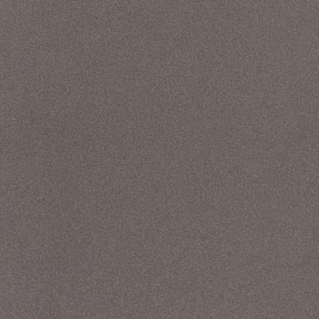 Dark grey terrazzo-look porcelain tile with fine grain texture, matte finish, and rectified edges for a refined, industrial-chic aesthetic.