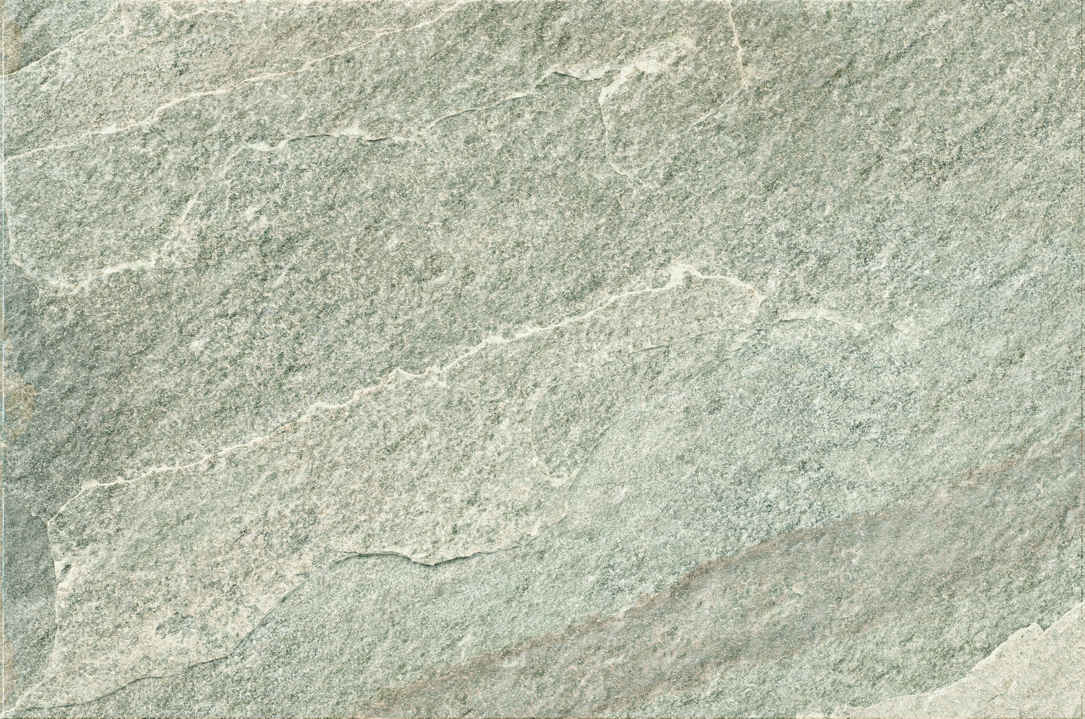 Rectified porcelain paving tile in Bianca Quartzite, a textured matte white surface with rustic elegance for refined outdoor spaces.