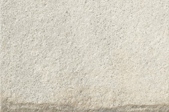 Rectified porcelain paving tile in Bianca Quartzite, a textured matte white surface with rustic elegance for refined outdoor spaces.