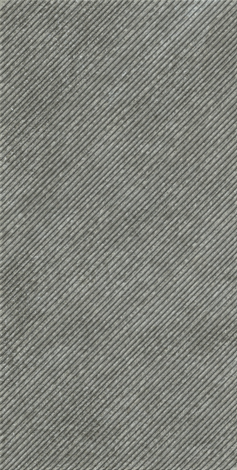 Matte gray porcelain wall tile with refined diagonal grooves, embodying contemporary deco luxury in a soft, textured finish.