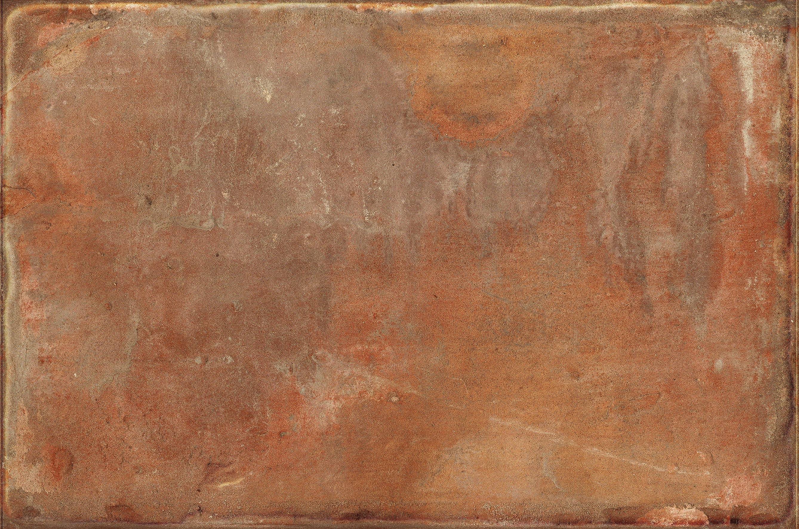 Textured terracotta cobblestone porcelain tile with warm Tuscan hues and rustic charm for elegant outdoor paving.