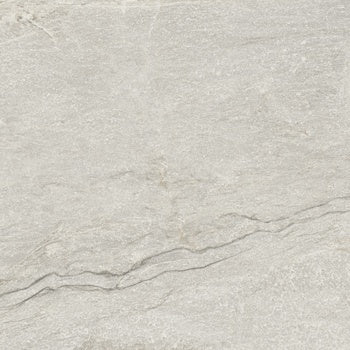 A warm beige quartzite-look porcelain tile with a soft matte finish, evoking serene primordial essence for intimate outdoor and indoor spaces.