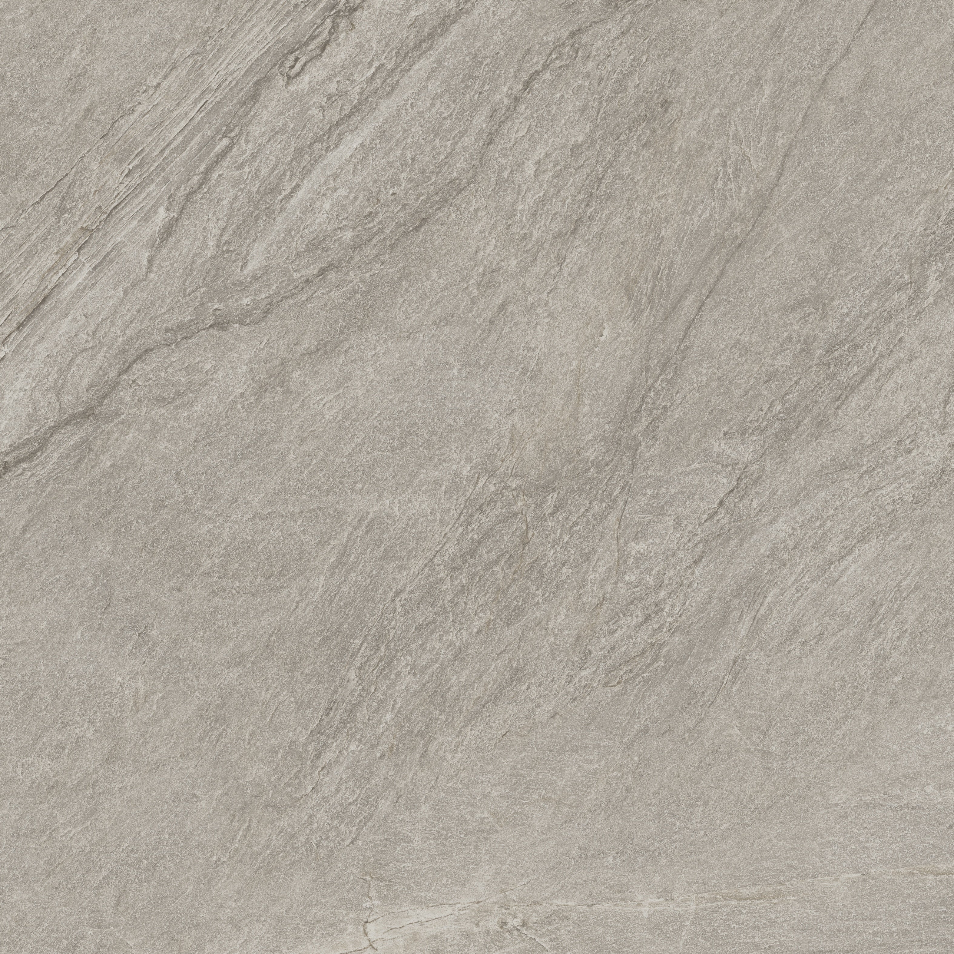A matte dark-beige porcelain tile with primordial quartzite essence, radiating warmth and depth for serene, intimate spaces.