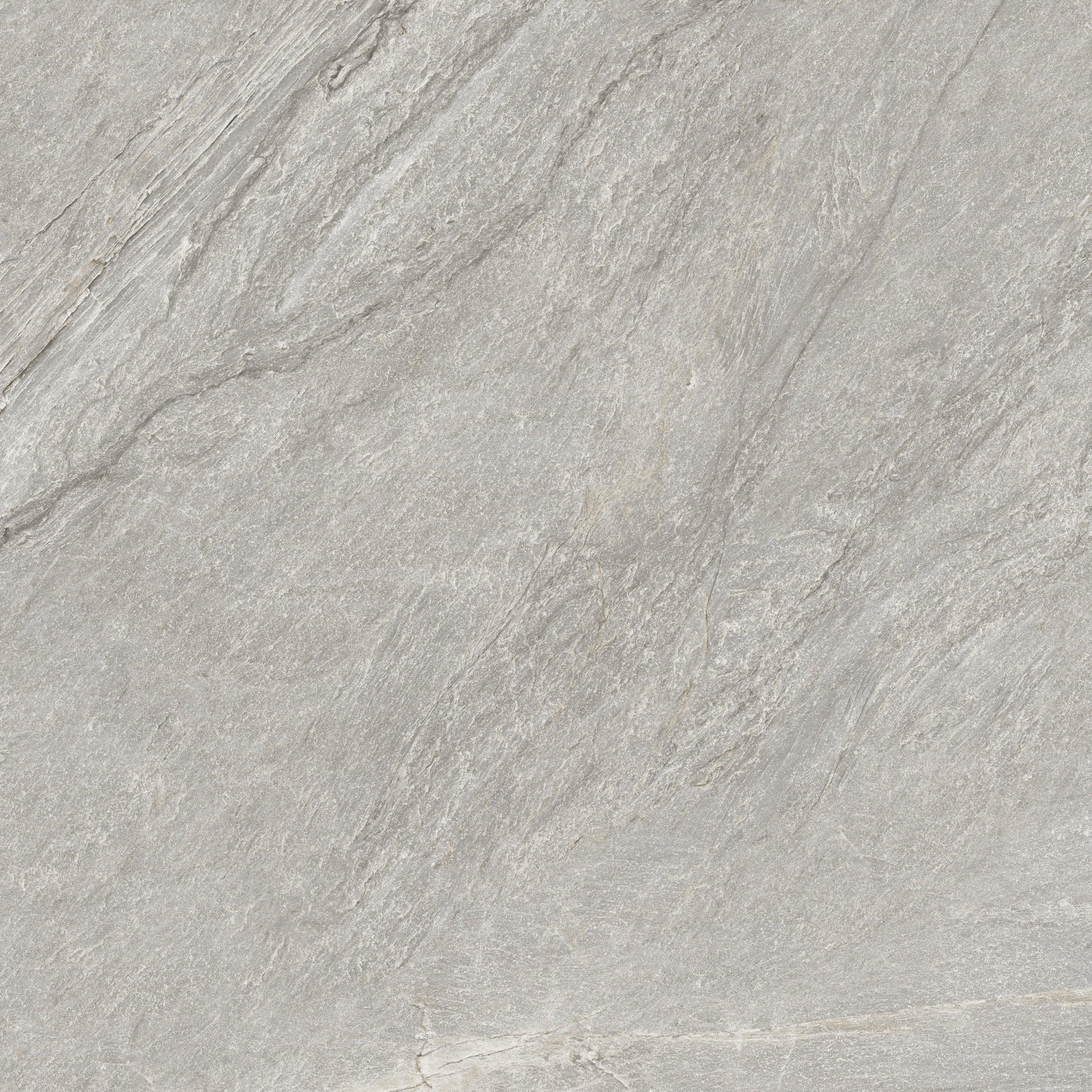 Matte gray porcelain paving tile with primordial quartzite texture, evoking serene depth for modern outdoor and indoor spaces.