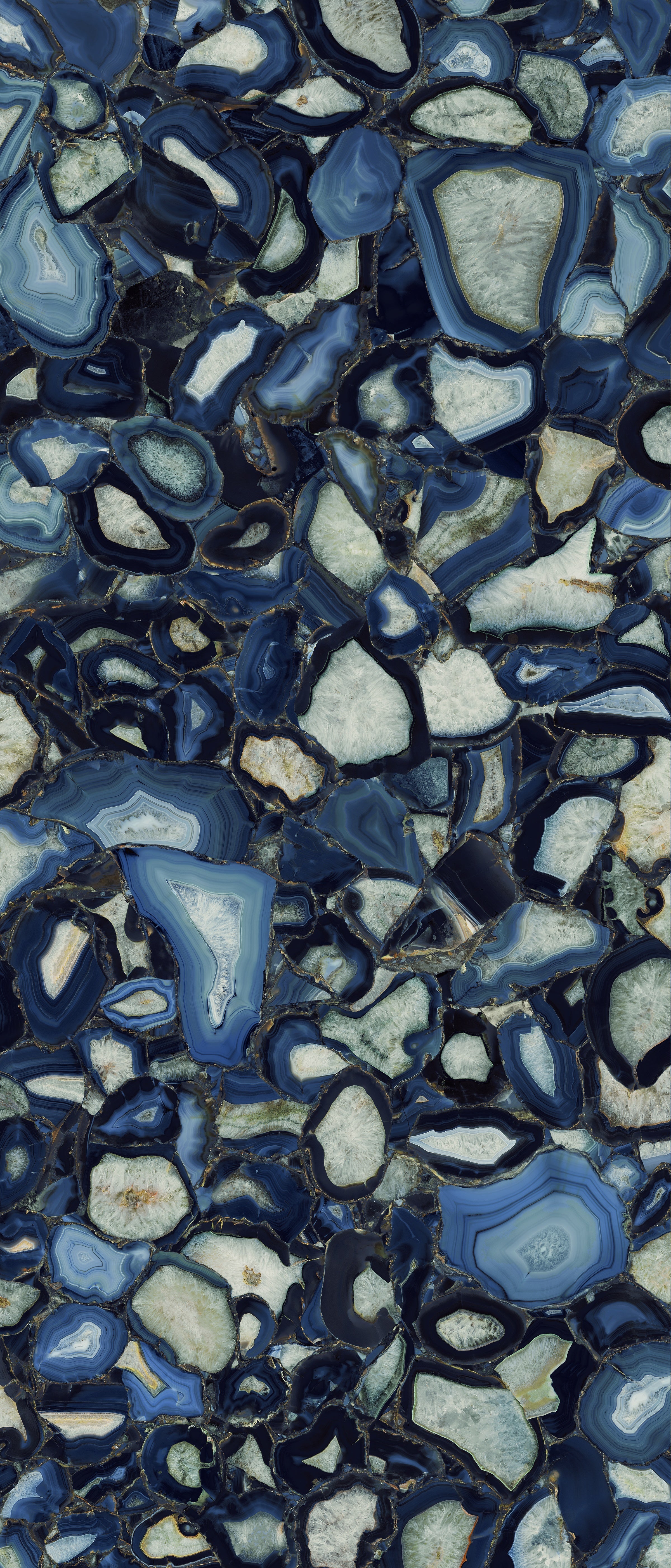 Luxurious agate-inspired porcelain tile in deep blue with refined veining and semi-gloss finish for timeless elegance.