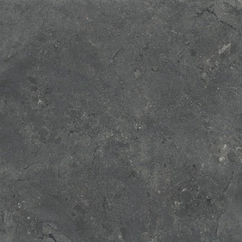 Dark gray porcelain wall tile with a textured matte finish, evoking sedimentary stone for a bold, playful, and sophisticated aesthetic.