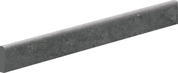 A textured dark gray porcelain bullnose trim with a matte finish, blending playful sophistication and bold, free-spirited elegance.