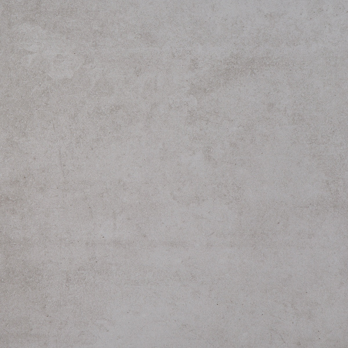 Matte white porcelain tile with warm earthy tones, embodying timeless elegance and handcrafted charm in a refined contemporary square.