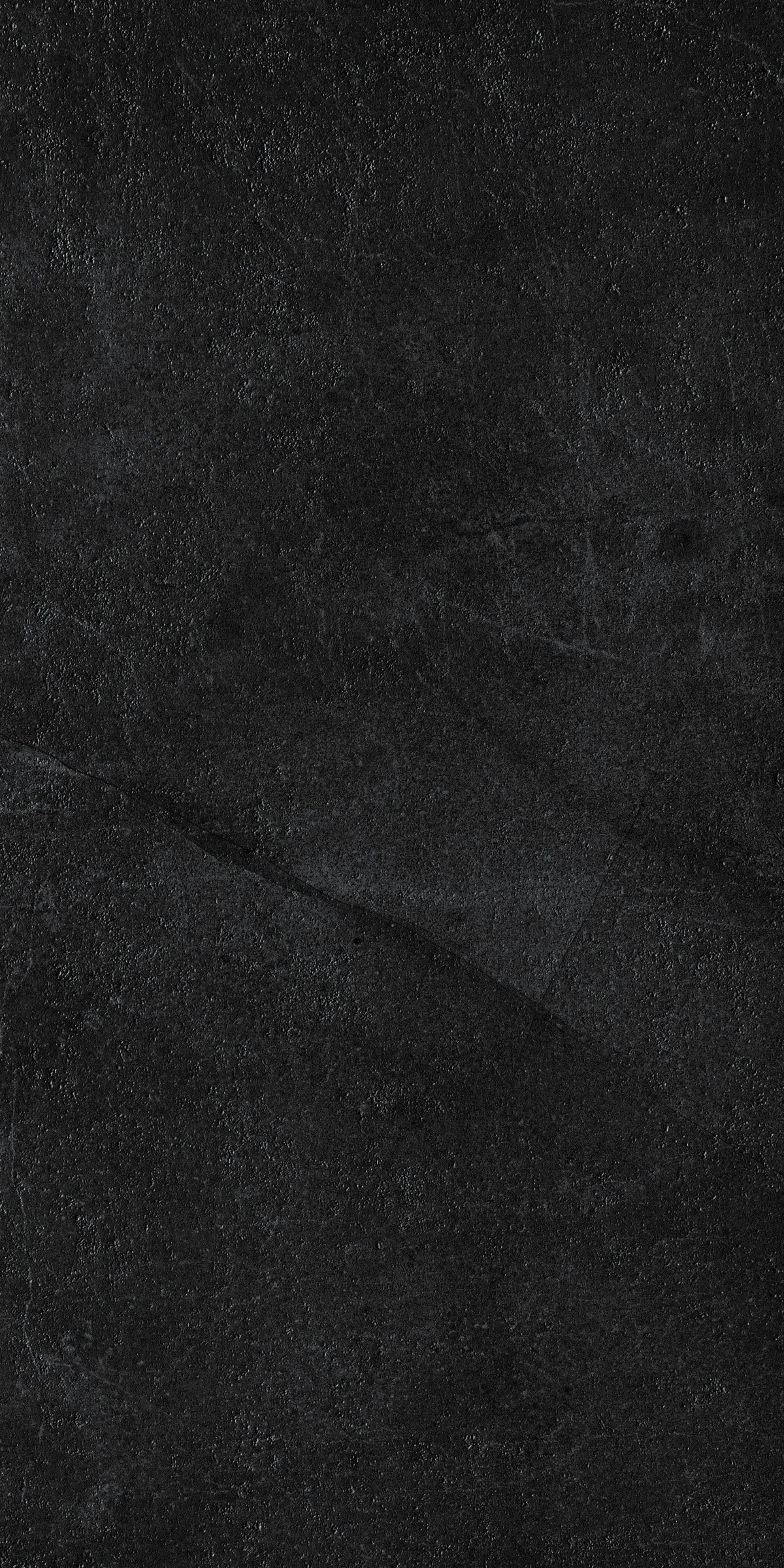 Sleek dark gray porcelain tile with a refined matte finish, embodying minimalist sophistication and timeless urban elegance.