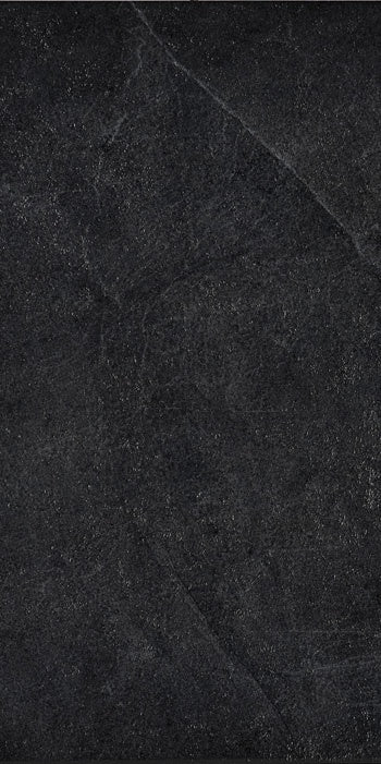 Dark grey rectified porcelain tile with a smooth matte finish, embodying minimalist sophistication and urban industrial chic.