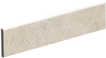 Sleek almond porcelain bullnose trim with a refined matte finish, blending minimalist elegance and understated luxury for seamless transitions.