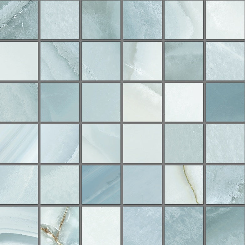 Matte white porcelain mosaic with delicate agate-inspired veining, evoking serene luxury and timeless elegance in a refined straight-stack pattern.
