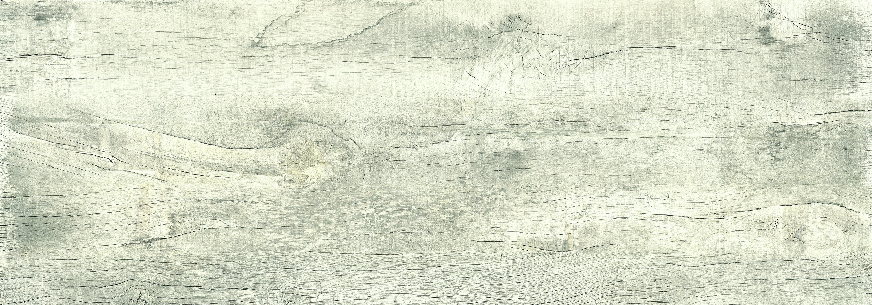 Sun-bleached porcelain plank with textured wood grain, matte finish, and rectified edges for a warm, sophisticated organic modern aesthetic.