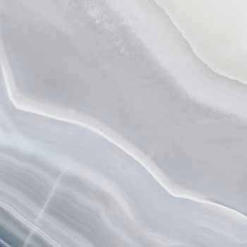 Luxurious porcelain tile with agate-inspired veining in soft white, exuding refined elegance and organic grandeur.