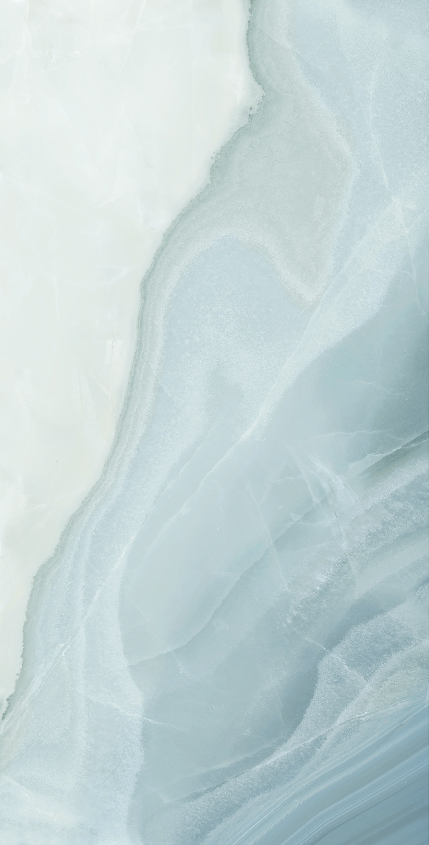 White agate-effect porcelain bullnose trim with semi-glossy finish and subtle veining for refined luxury interiors.