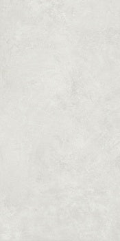 Matte white porcelain wall tile with a refined plaster-like texture, exuding minimalist elegance and serene luxury.
