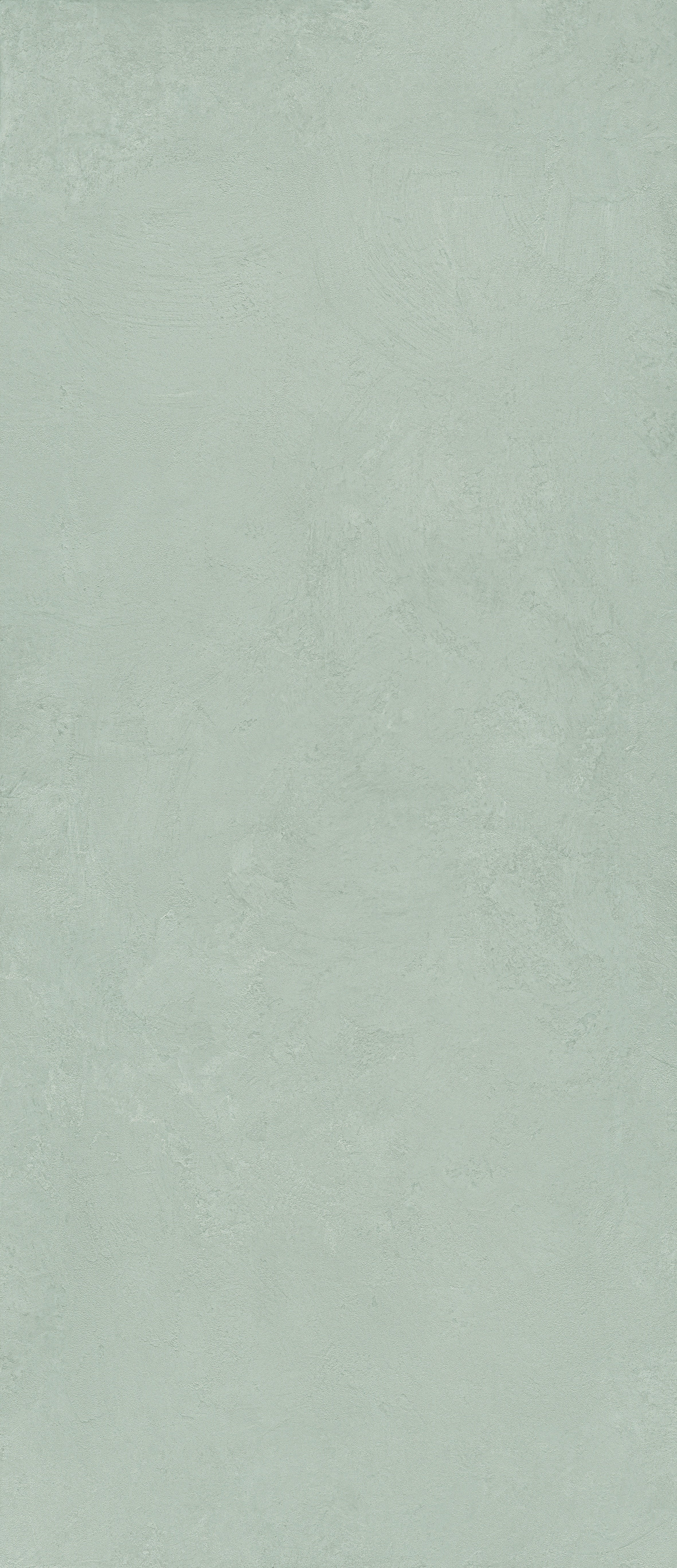 A sleek, matte silver porcelain tile with a refined plaster-like texture, exuding minimalist elegance and timeless serenity.