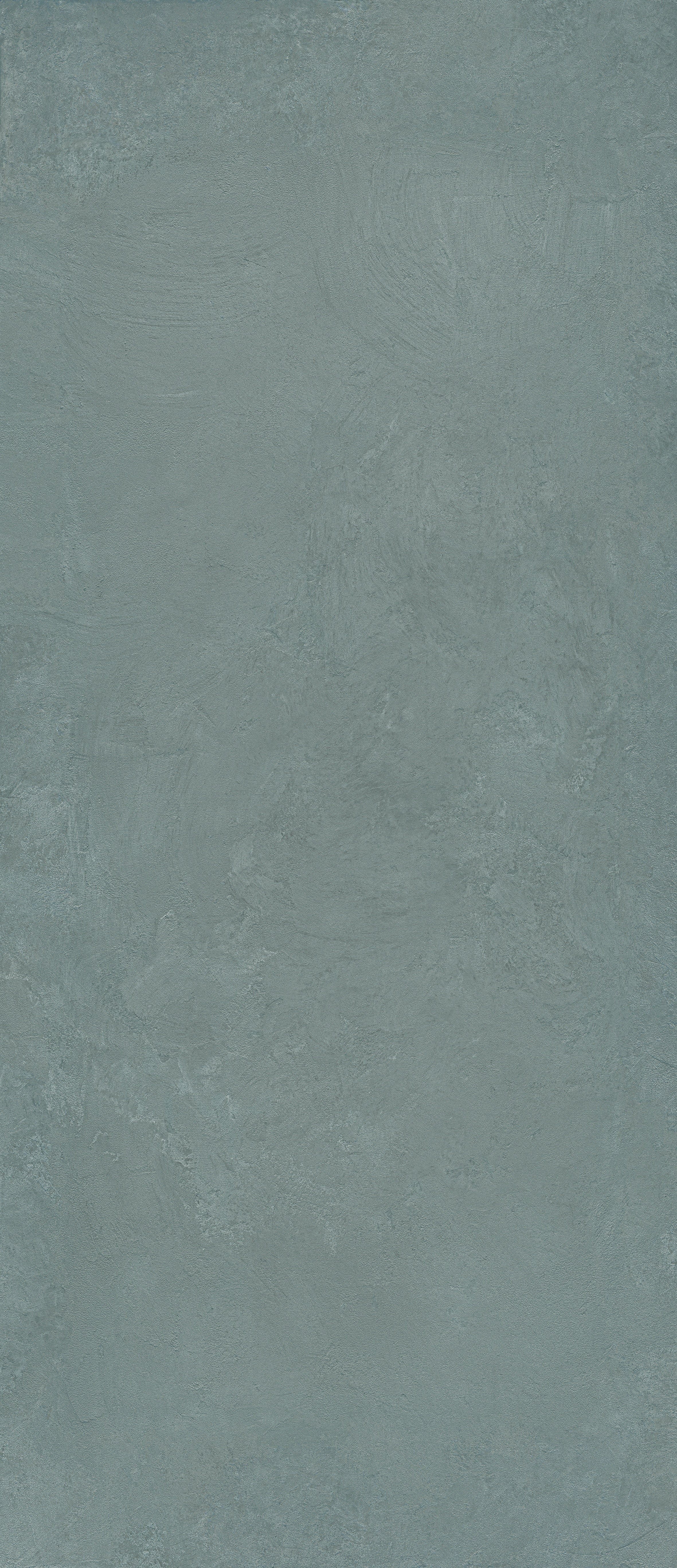 Matte middle-grey porcelain wall tile with a refined plaster-like texture, exuding minimalist elegance and serene luxury.