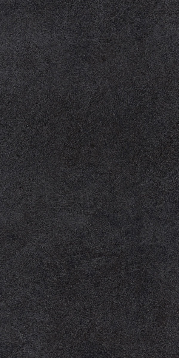 Black matte porcelain tile with a sleek 3D resin texture, embodying minimalist sophistication for modern residential and commercial spaces.