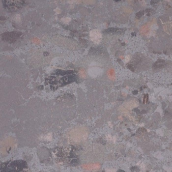 Dark grey terrazzo-effect porcelain tile with raw, unpredictable chips and a refined matte texture, exuding industrial elegance and timeless sophistication.