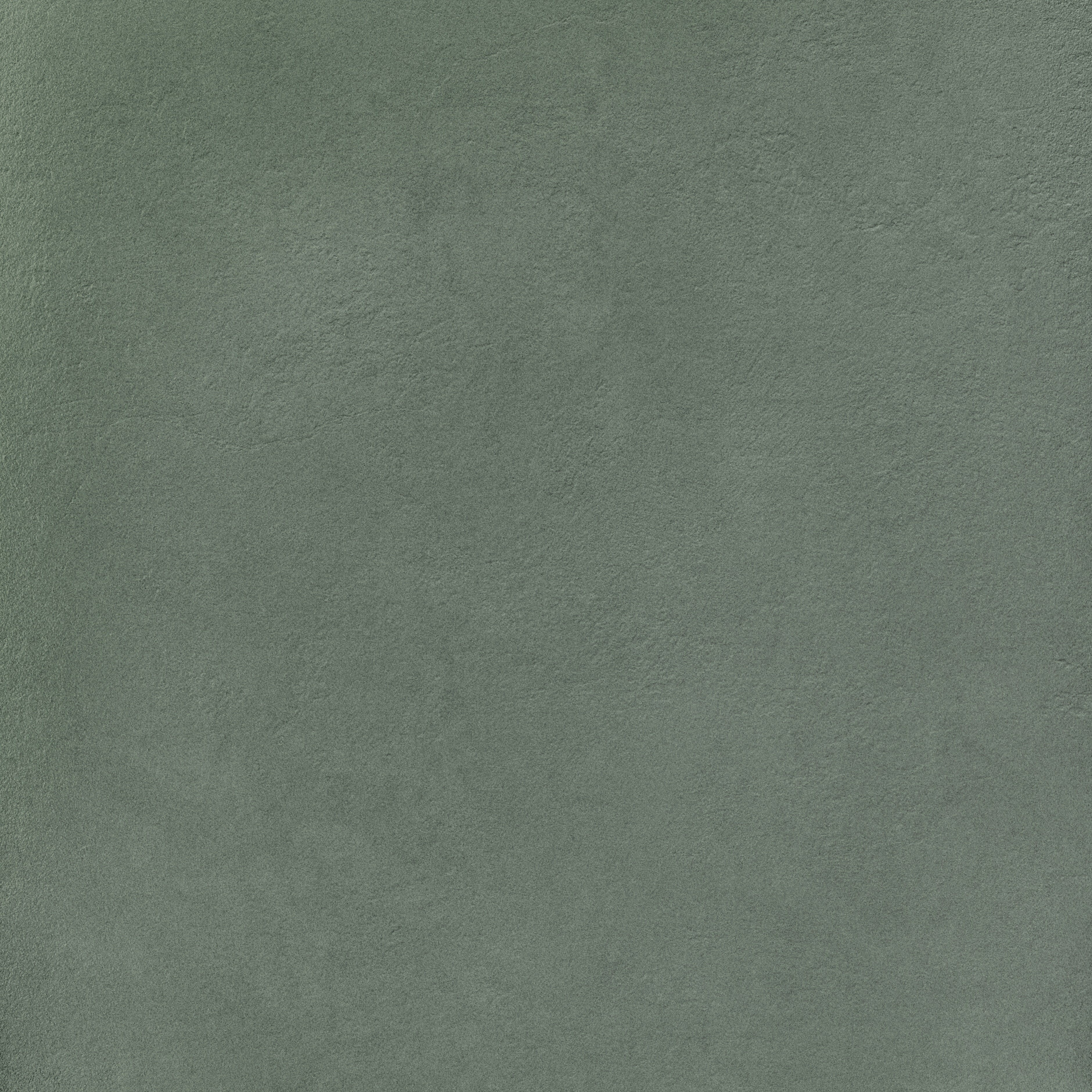 Dark gray concrete-look porcelain tile with a raw, textured matte finish, embodying industrial elegance and brutalist strength.