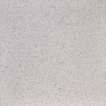 Large-format porcelain tile with a glossy terrazzo finish, featuring white through-body chips and flakes for timeless sophistication.