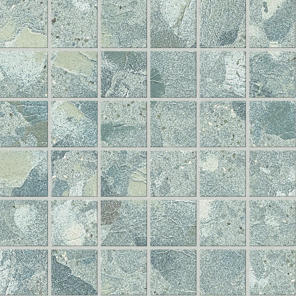 Textured terrazzo mosaic tiles in soft gray with raw, unpredictable chips, exuding industrial elegance and timeless sophistication.
