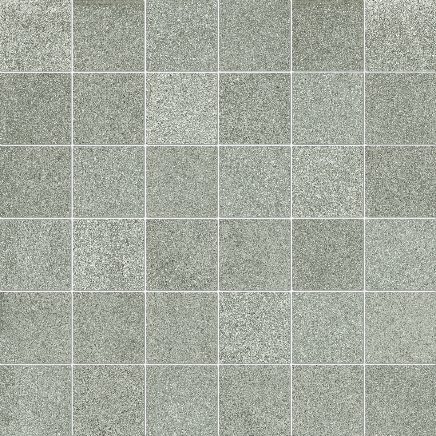 Matte silver-gray interlocking porcelain mosaic with soft 3D texture, evoking refined industrial elegance and timeless monochromatic depth.