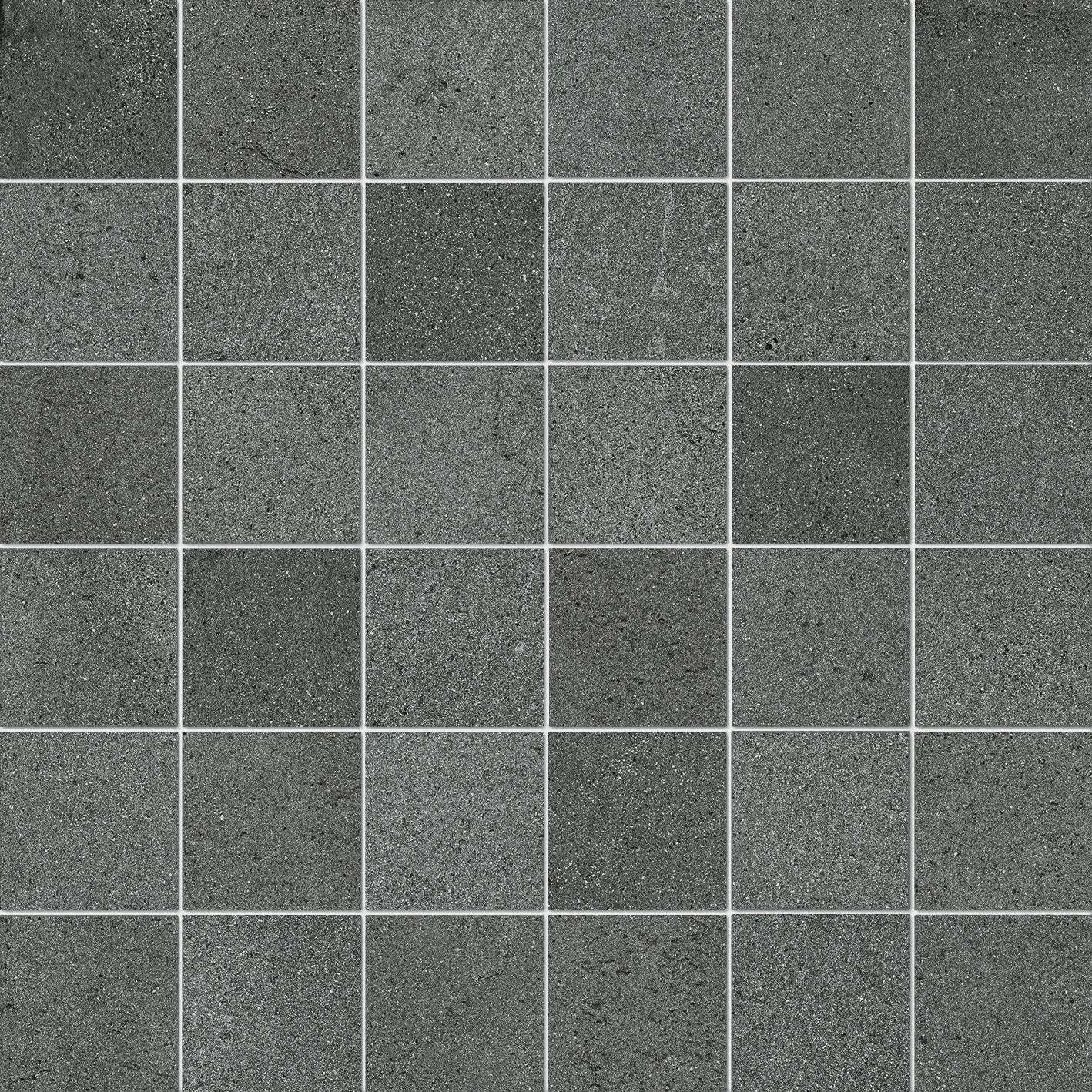 Dark gray interlocking porcelain mosaic with a refined concrete texture, matte finish, and subtle 3D depth for sophisticated spaces.