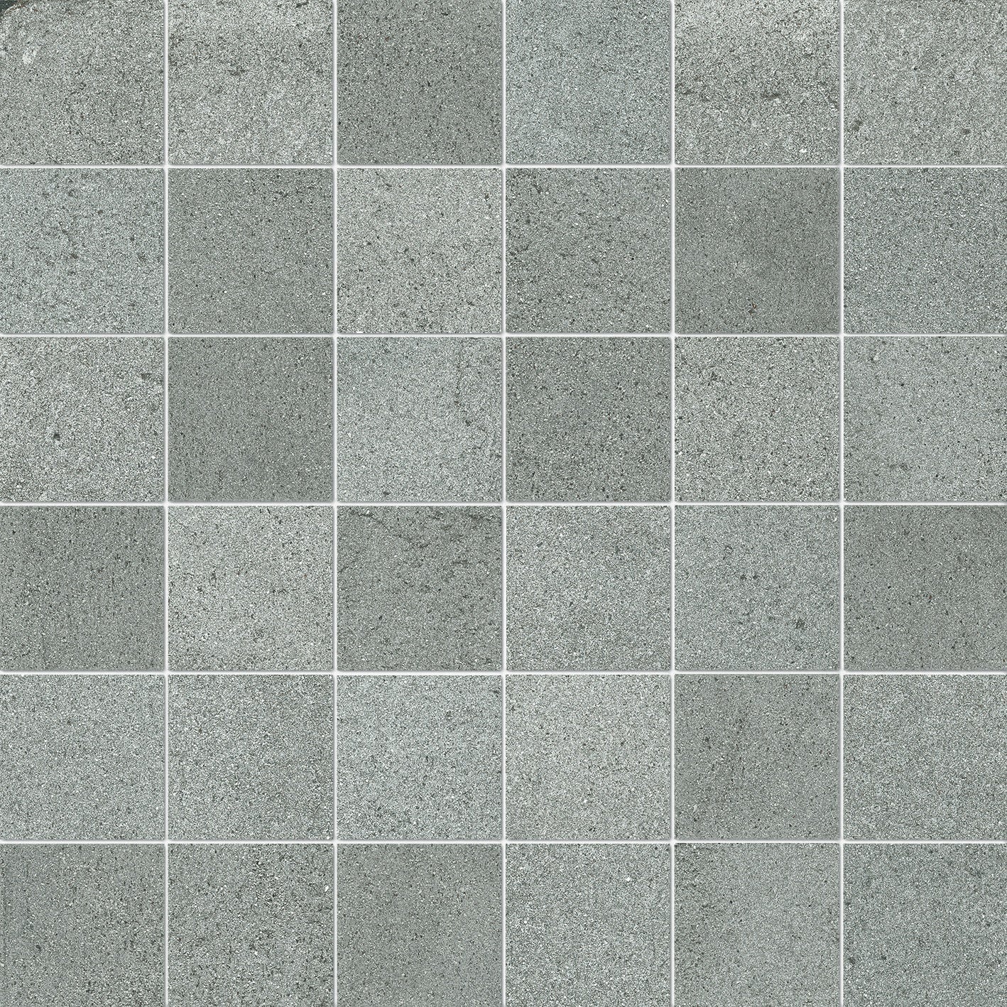 Matte gray porcelain mosaic with soft concrete texture, refined industrial elegance for timeless interiors.
