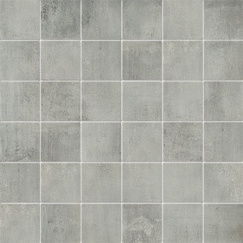 Industrial-chic porcelain mosaic in warm gray, blending minimalist cement aesthetics with the organic texture of fired ceramic tiles.