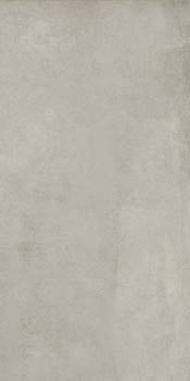 Matte silver-gray porcelain tile with soft 3D texture, evoking industrial elegance and timeless concrete allure.
