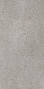 Matte gray porcelain tile with soft 3D texture, evoking refined industrial elegance in a timeless concrete-inspired finish.